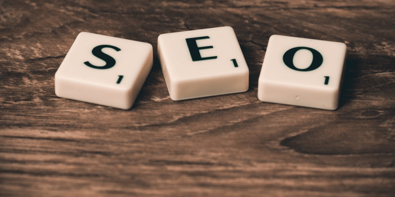 "SEO" spelled out with Scrabble tiles.